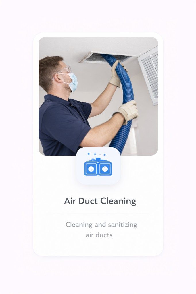 Technician cleaning HVAC air ducts
