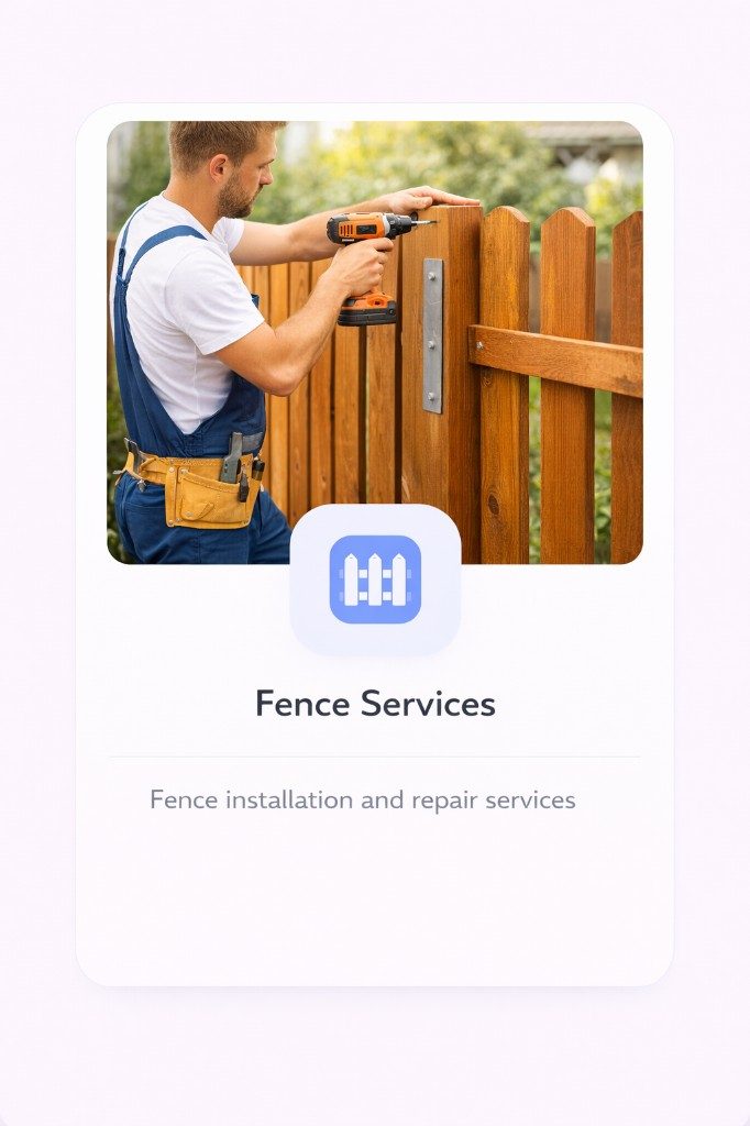 Technicians installing a wooden fence in a backyard