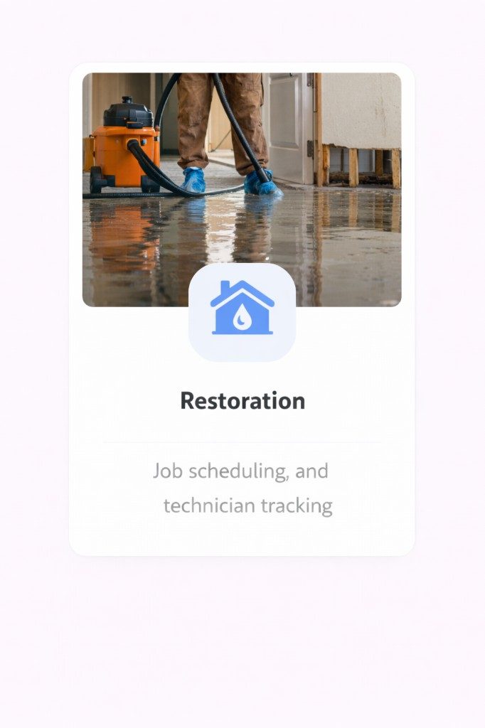 Restoration team drying a flooded room