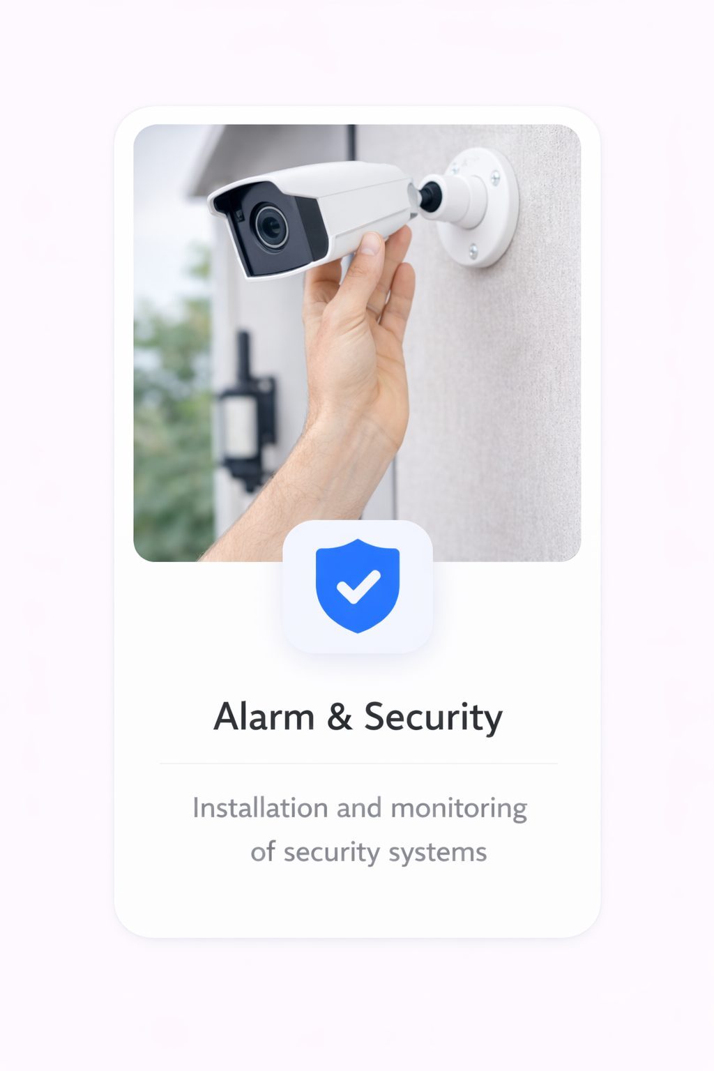 Security technician configuring an alarm control panel
